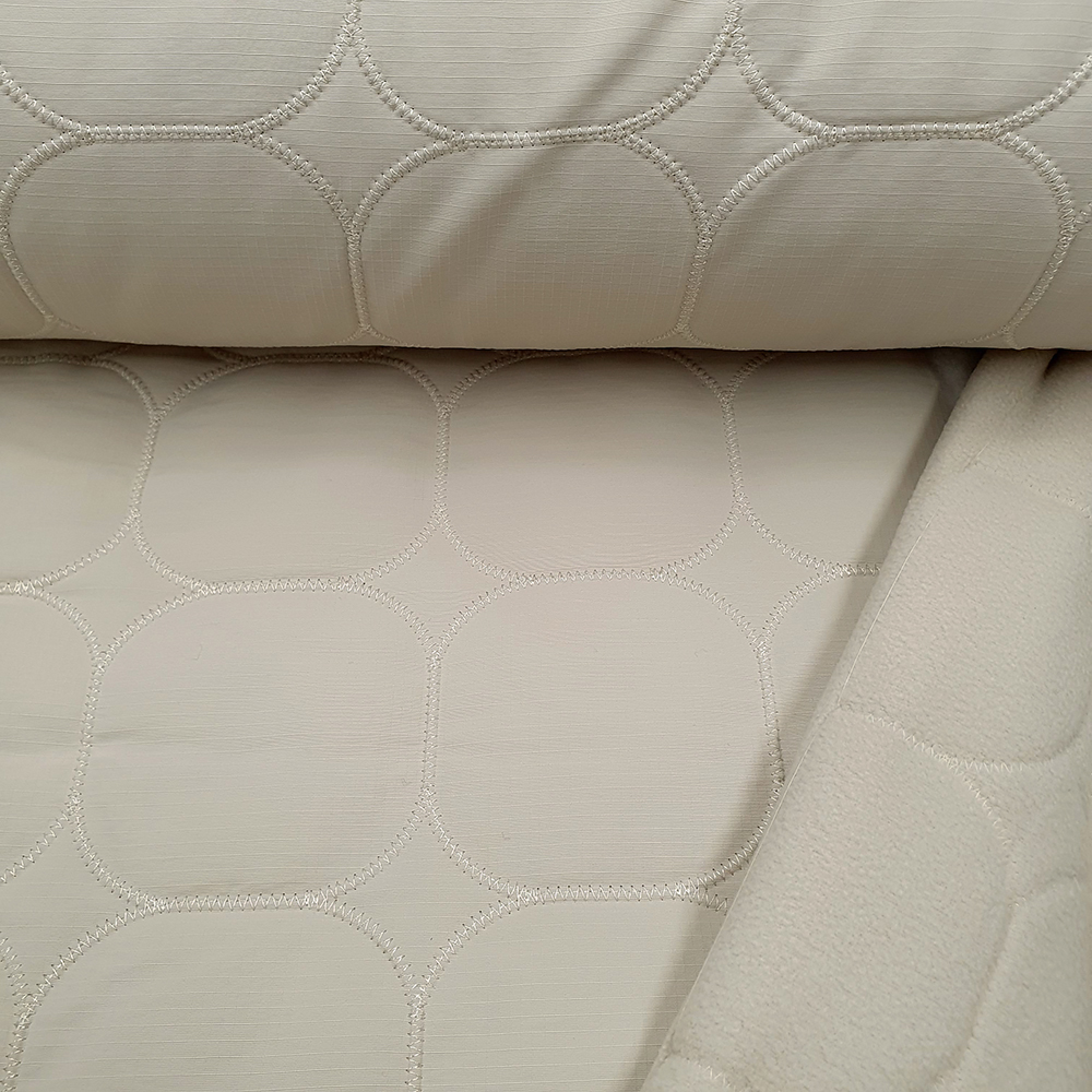 <div class='designation1'>Toptex Steppstoff, linke Seite Fleece</div><div class='designation2'>145cm, 60%PES, 40%PA, 630g/lfm</div>